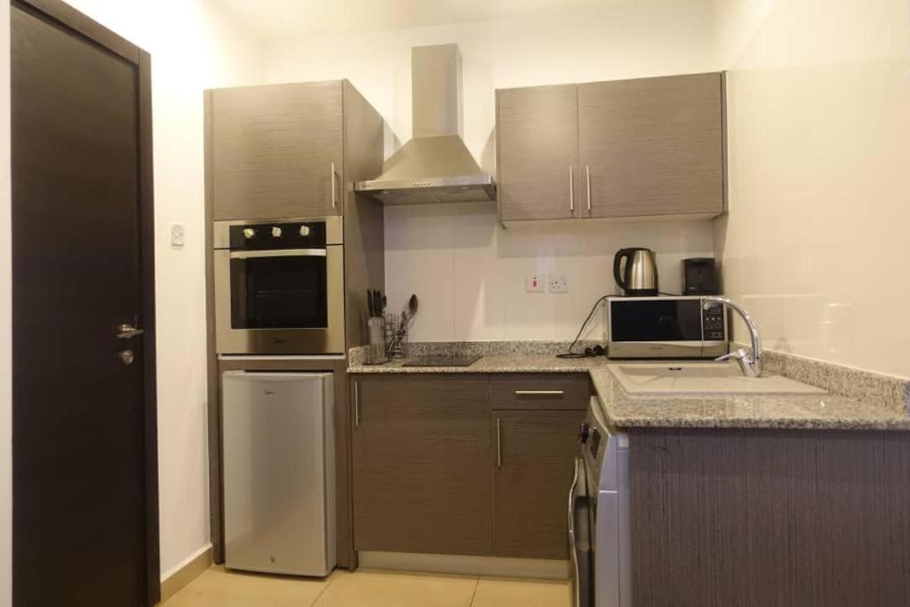 The Gallery Luxury Suites Cpg East Legon Exterior foto